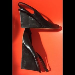 Miu Miu sling-back wedge with the twist